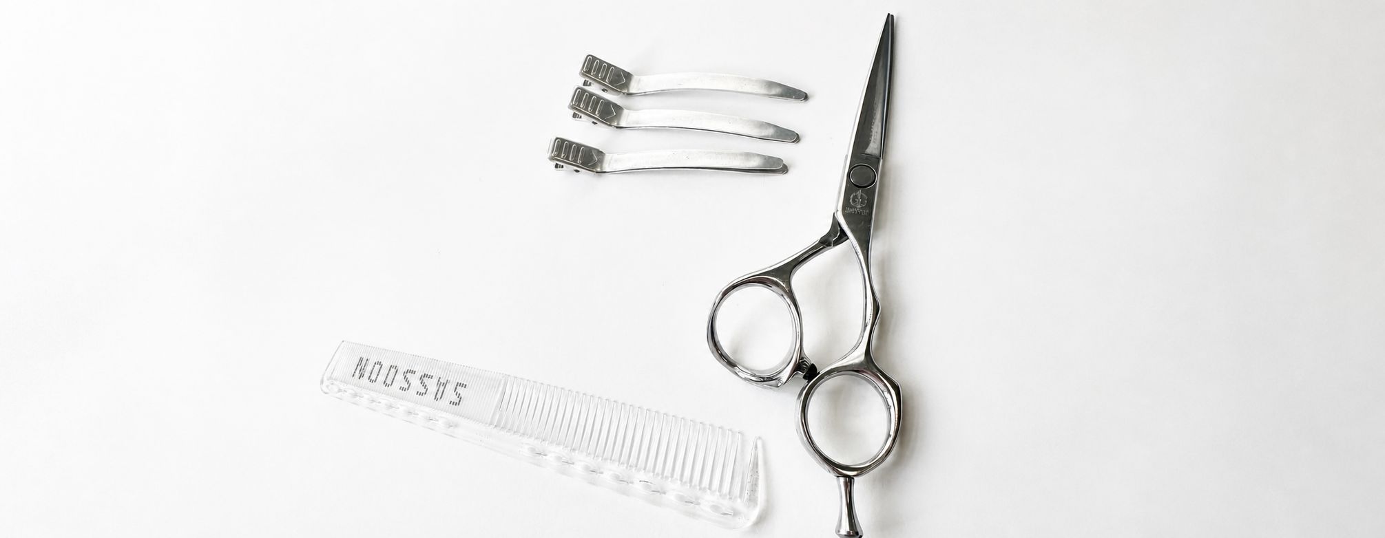 Editorial photo of hairdressing tools, Mizutani scissors and combs in the studio